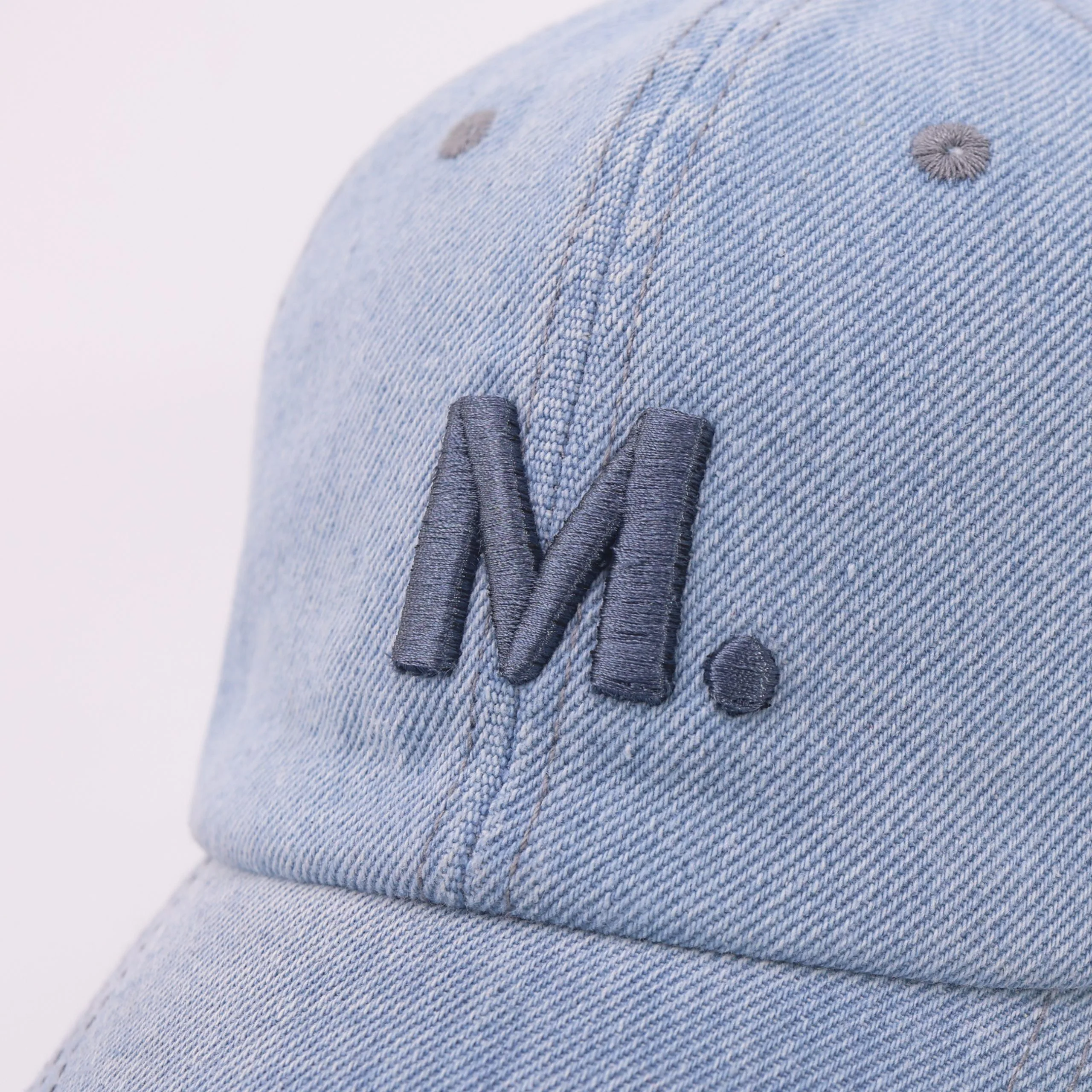 Mossarium unisex light wash denim cap with M embroidery