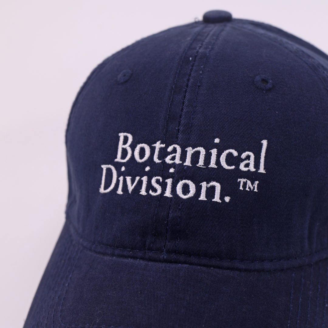 Mossarium unisex navy cap with Botanical Division logo embroidery